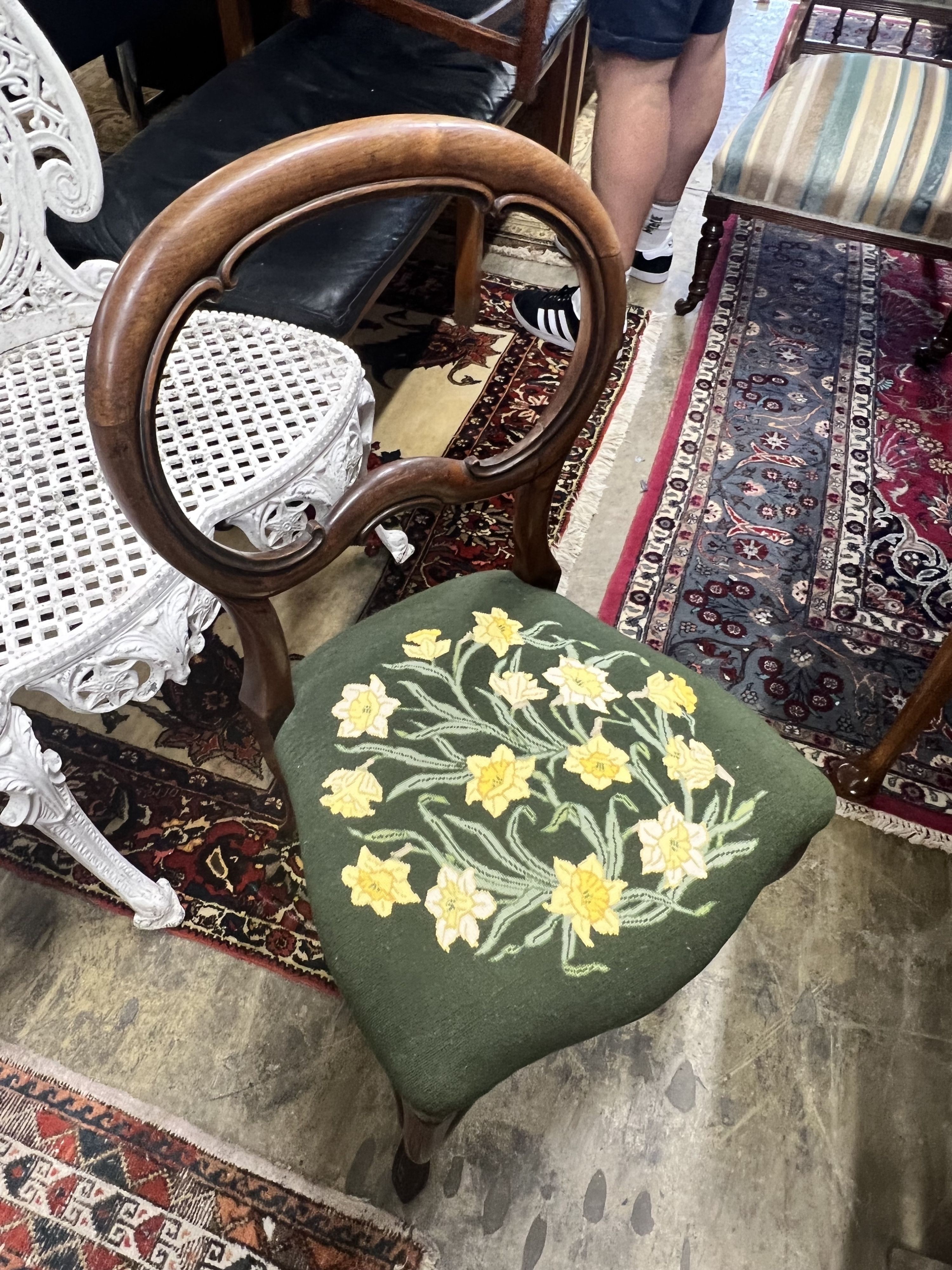 A George III Provincial elm elbow chair, a Victorian nursing chair, and a dining chair